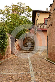 Very Narrow Streets Of A Quaint Village With Its Black Slate Roofs In Madriguera. Architecture Vacation Travel Rural Life. photo