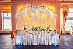 Very nicely decorated wedding table for groom and bride.