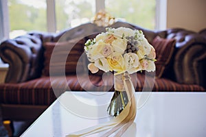 A very nicely decorated wedding table with plates and serviettes.