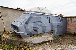 Very old abandoned van painted and used as a tool farm shed