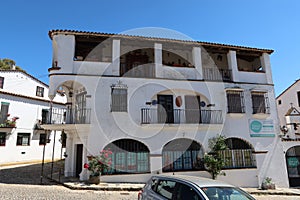Very old building in Pozo de la Nieve street. Aracena, Huelva, Spain photo