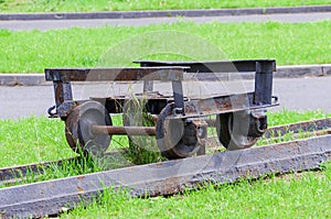 Very old cart on rails for transporting ore