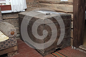 A very old chest in a wooden house