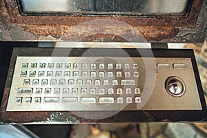 Very old computer, rusty keyboard with monitor