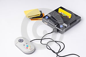 Very old console on a white background. Nostalgia