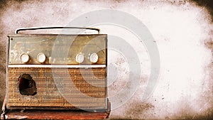 A very old, damaged radio player with an old picture background