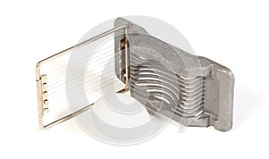 Very old egg cutter isolated
