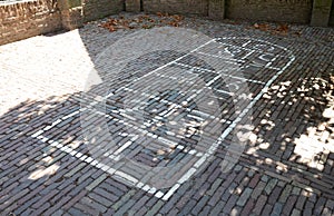 Very old hopscotch board at schoolyard