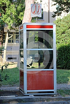 very old italian phone box photo