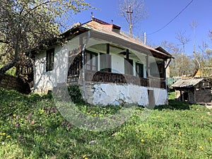 a very old peasant house that awaits its visitors