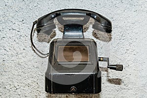 Very old phone on the wall