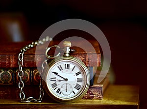 Very old pocket watch and books