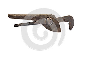 Very old, rusty adjustable wrench on a white background