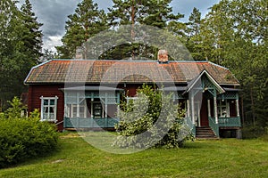 Very old Swedish mansion with a garden inside the forest.