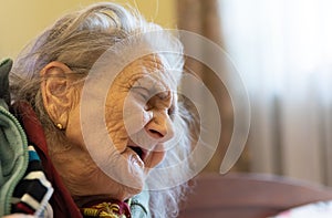 Very old tired woman