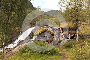 Very old watermills with grassy roofs in Norway