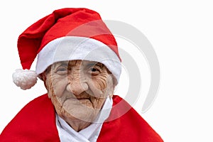 Very old woman 90 years old Mrs Claus with funny expression. Grand-mother or elderly woman with big happy smile wearing Santa