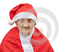 Very old woman 90 years old Mrs Claus with funny expression. Grand-mother or elderly woman with big happy smile wearing Santa