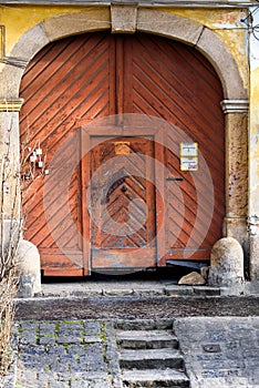 Very old wood gate in old city of small european city