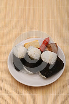 It is a very popular food in Japan. It is also called `omusubi` or `nigiri-meshi` and is often used for lunch boxes.