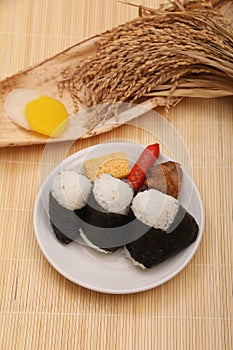 It is a very popular food in Japan. It is also called `omusubi` or `nigiri-meshi` and is often used for lunch boxes.