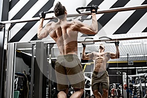 Man bodybuilder in gym