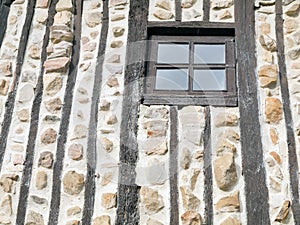 Very rustic window on an old mountain cabin.
