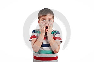 Very scared and surprised boy isolated on white background.