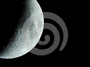 Very sharp close-up of the rising crescent moon in the night sky