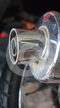 A very sleek motorcycle exhaust made of good iron. Macros and photo products. Suitable for people who are looking for photos about