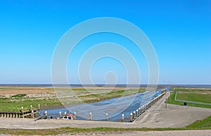 The very small tidal sea harbor of Noordpolderzijl at the Wadden