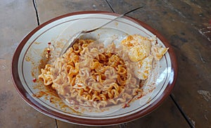 Very spicy fried noodles with chicken egg