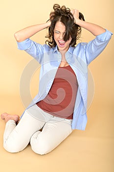 Very Stressed Young Woman Screaming Pulling Out Hair