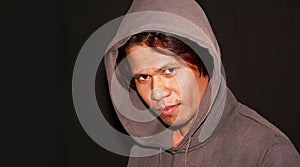 Very strong look of an asian man- portraiture enhance lighting photo