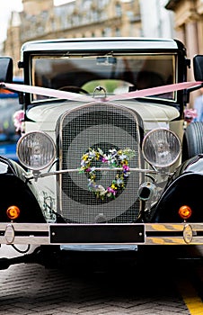 Very stylish wedding vehicle waiting to pick up the bride and groom