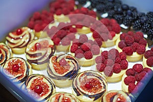 Very sweet delicious small cakes made from berries and figs for candy bar