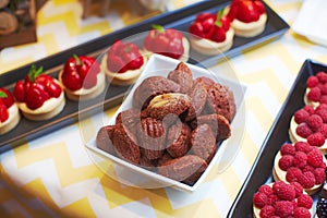 Very sweet delicious small cakes made from berries and figs for candy bar