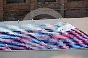 Very Thin Cloth Sheets of Various Colors in Blue, Purple, Fuchsia Rolled Close to Each other Outdoors