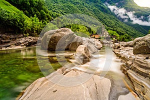 Verzasca River at Lavertezzo - clear and turquoise water stream and rocks in Ticino - Valle Verzasca - Valley in Tessin,