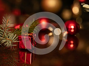 VeselÃ© Vianoce - red Christmas gift on the background of lights, christmas time