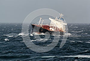 Vessel at anchor in storm weather