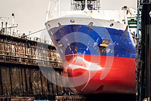 Vessel in a ship repair drydock in the port