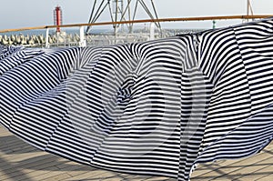 Vest Russian sailors sewed together in the form of a curtain on the deck