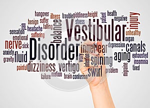 Vestibular disorder word cloud and hand with marker concept photo
