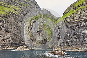 Vestmanna stunning cliffs and atlantic ocean, the elephant. Faroe islands photo