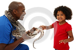 Vet and Preschool Child Snake Owner Helping Pet