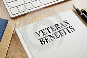 Veteran Benefits on a desk.