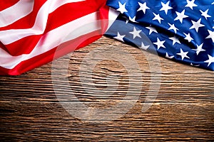 Veterans day. Honoring all who served. American flag on wooden background with copy space