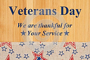 Veterans day type message with retro USA stars and stripes ribbon