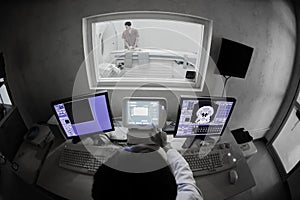 Veterinarian doctor with MRI computer control